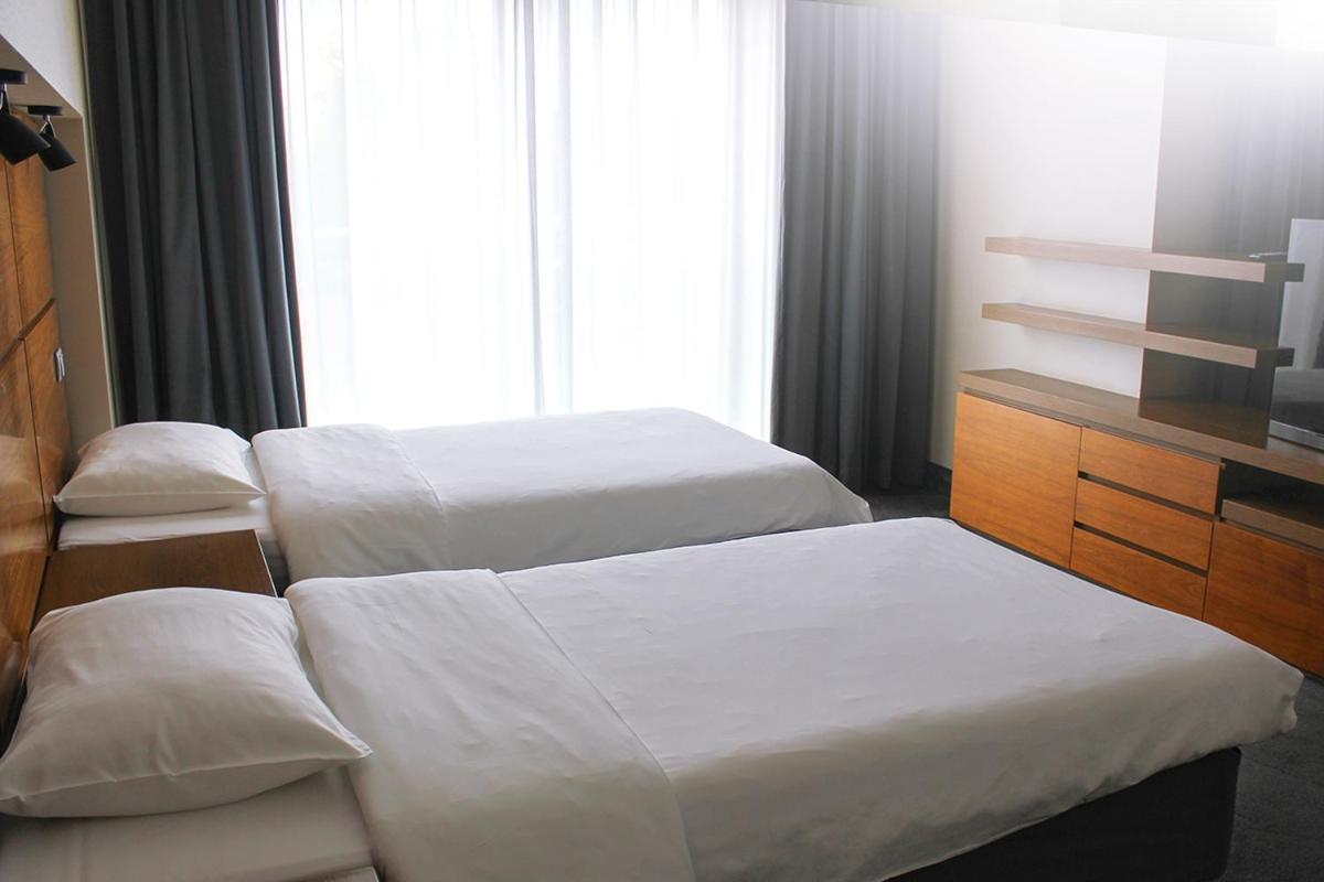 Willa Port Ostróda Exterior foto A bedroom at the hotel